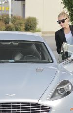 SOPHIA THOMALLA at a Gas Station with Her Aston Martin in Los Angeles 03/20/2018