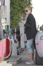 SOPHIA THOMALLA at a Gas Station with Her Aston Martin in Los Angeles 03/20/2018