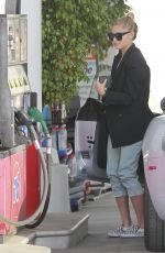 SOPHIA THOMALLA at a Gas Station with Her Aston Martin in Los Angeles 03/20/2018