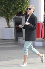 SOPHIA THOMALLA at a Gas Station with Her Aston Martin in Los Angeles 03/20/2018