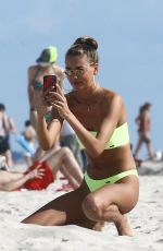 ALINA BAIKOVA in Bikinis at a Beach in Miami 04/01/2018
