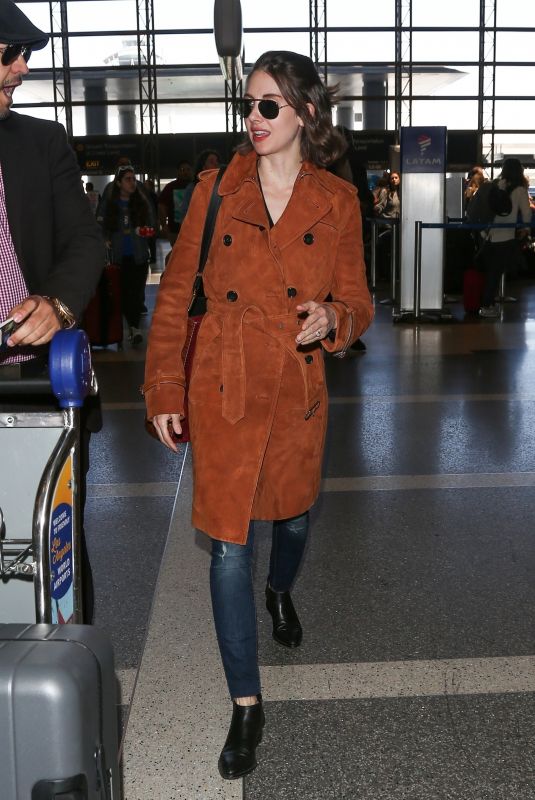ALISON BRIE at LAX Airport in Los Angeles 04/16/2018