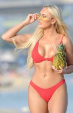 AMBER TURNER in Bikini at a Beach in Dubai 04/06/2018