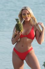 AMBER TURNER in Bikini at a Beach in Dubai 04/06/2018
