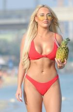 AMBER TURNER in Bikini at a Beach in Dubai 04/06/2018