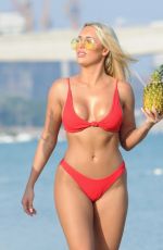 AMBER TURNER in Bikini at a Beach in Dubai 04/06/2018