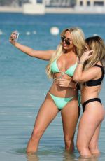 AMBER TURNER in Bikini at a Beach in Dubai 04/13/2018