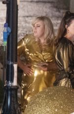 ANNE HATHAWAY and REBEL WILSON on the Set of THe Hustle in London 04/12/2018