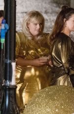 ANNE HATHAWAY and REBEL WILSON on the Set of THe Hustle in London 04/12/2018