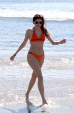BLANCA BLANCO in a Orange Bikini at a Beach in Malibu 04/03/2018