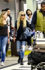 CARMEN ELECTRA Arrives at Airport in Miami 04/13/2018