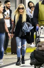 CARMEN ELECTRA Arrives at Airport in Miami 04/13/2018