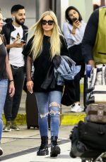 CARMEN ELECTRA Arrives at Airport in Miami 04/13/2018