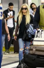 CARMEN ELECTRA Arrives at Airport in Miami 04/13/2018