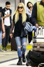 CARMEN ELECTRA Arrives at Airport in Miami 04/13/2018