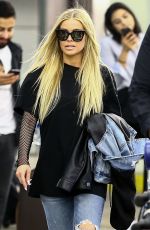 CARMEN ELECTRA Arrives at Airport in Miami 04/13/2018