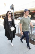 CHLOE BRIDGES and Adam Devine at LAX Airport in Los Angeles 04/20/2018