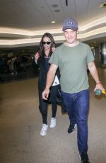 CHLOE BRIDGES and Adam Devine at LAX Airport in Los Angeles 04/20/2018