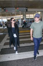 CHLOE BRIDGES and Adam Devine at LAX Airport in Los Angeles 04/20/2018