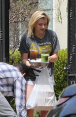 CHLOE MORETZ Receives Food Delivery at Her Home in Los Angeles 04/05/2018