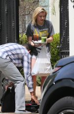 CHLOE MORETZ Receives Food Delivery at Her Home in Los Angeles 04/05/2018