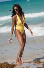 CLAUDIA JORDAN in Swimsuit at a Beach in Miami 04/13/2018