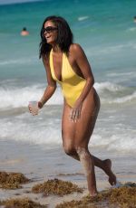 CLAUDIA JORDAN in Swimsuit at a Beach in Miami 04/13/2018