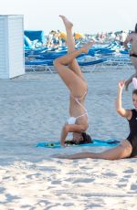 CLAUDIA ROMANI and MELISSA LORI in Bikinis at a Beach in Miami 04/01/2018