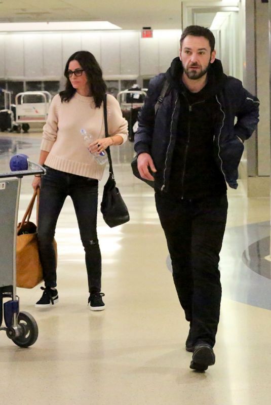 COURTENEY COX and Johnny McDaid at LAX Airport in Los Angeles 04/20/2018