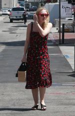 DAKOTA FANNING Out and About in Beverly Hills 04/23/2018
