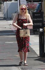 DAKOTA FANNING Out and About in Beverly Hills 04/23/2018