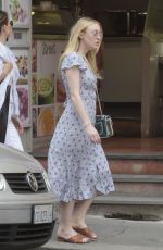 DAKOTA FANNING Out and About in Rome 04/16/2018