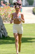 DANIELLE LLOYD in Bikini Top on Vacation in Spain 04/16/2018