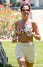 DANIELLE LLOYD in Bikini Top on Vacation in Spain 04/16/2018