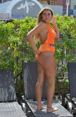 ELLIE YOUNG in Swimsuit on Vacation in Spain 04/21/2018