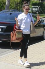 EMMY ROSSUM with Her Dog in a Pet Purse Out in Hollywood 04/11/2018