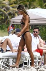 ERIKA WHEATON in Bikini at a Beach in Miami 03/31/2018