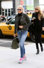GIGI HADID Leaves Trump Soho Hotel in New York 04/04/2018