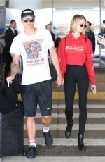 HAILEY CLAUSON and Julian Herrera at LAX Airport in Los Angeles 04/06/2018