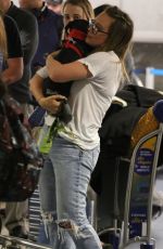 HILARY DUFF with Her Dog at LAX Airport in Los Angeles 04/12/2018