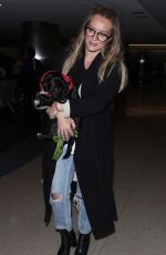 HILARY DUFF with Her Dog at LAX Airport in Los Angeles 04/12/2018