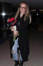 HILARY DUFF with Her Dog at LAX Airport in Los Angeles 04/12/2018