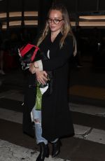 HILARY DUFF with Her Dog at LAX Airport in Los Angeles 04/12/2018