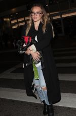 HILARY DUFF with Her Dog at LAX Airport in Los Angeles 04/12/2018