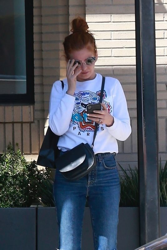 ISLA FISHER Leaves Barneys New York in Beverly Hills 04/19/2018