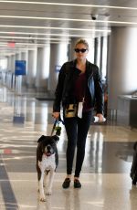 KATE UPTON and Her Dog at LAX Airport in Los Angeles 04/22/2018