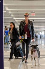 KATE UPTON and Her Dog at LAX Airport in Los Angeles 04/22/2018