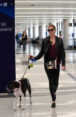 KATE UPTON and Her Dog at LAX Airport in Los Angeles 04/22/2018