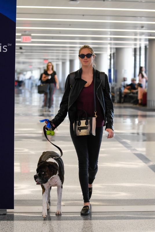 KATE UPTON and Her Dog at LAX Airport in Los Angeles 04/22/2018