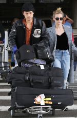 LILI REINHART and Cole Sprouse  at LAX Airport in Los Angeles 04/04/2018